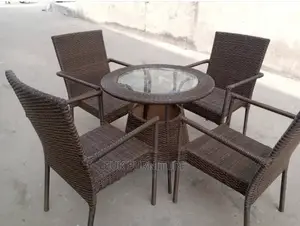 Ratan Outdoor Chairs ( Table and the Four Chairs)