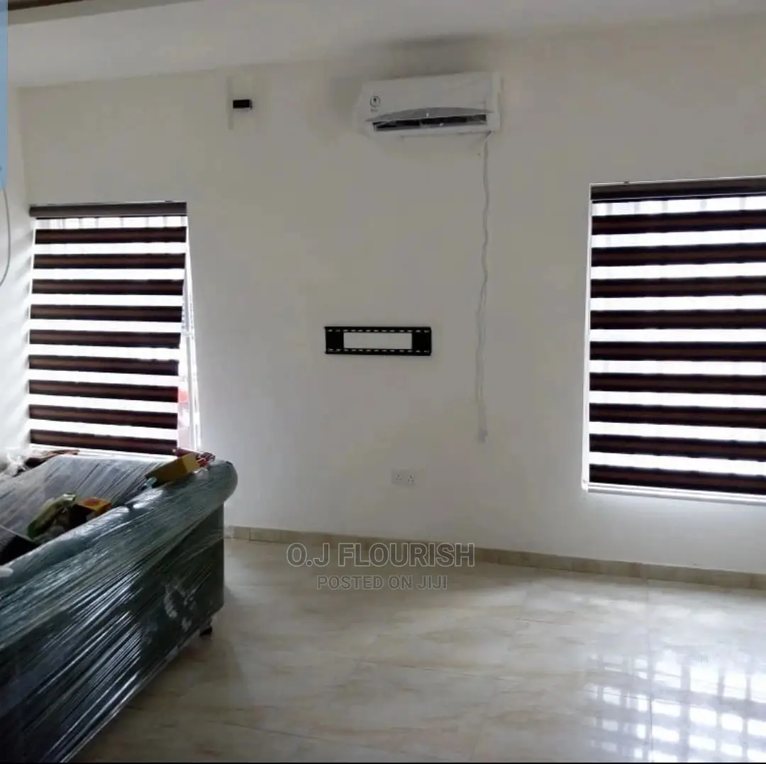 Burnt Orange and Black Window Blinds