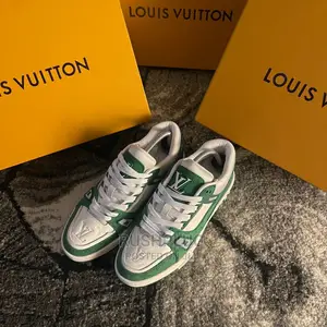Louis Vuitton Monogram Embossed Calf Leather Sneakers