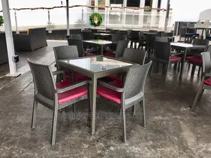 Rattan Chairs and Table With Cushion
