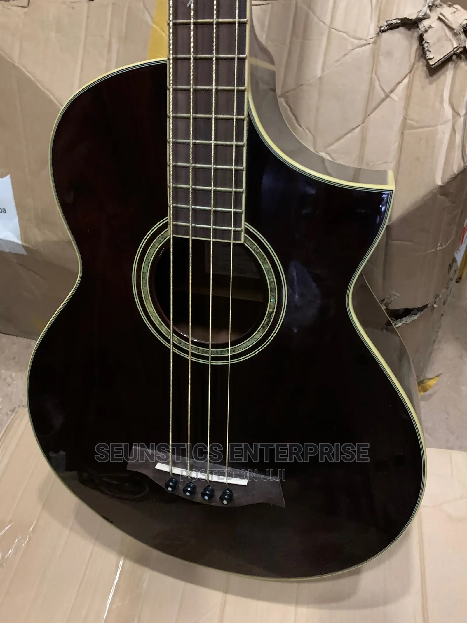 Quality Ibanez Four String Electro Acoustic Guitar