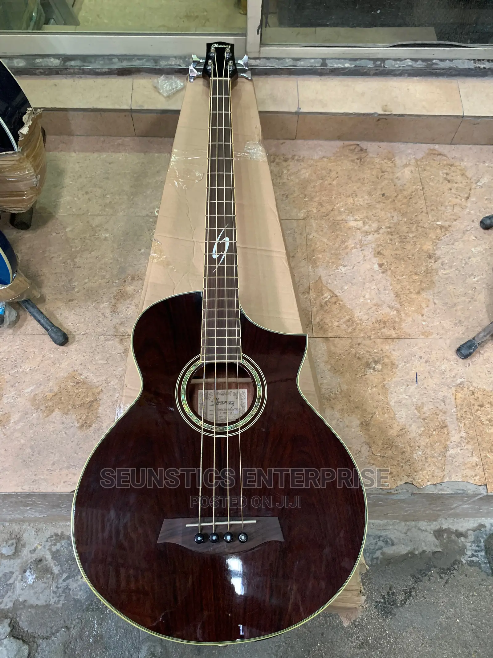 Quality Ibanez Four String Electro Acoustic Guitar