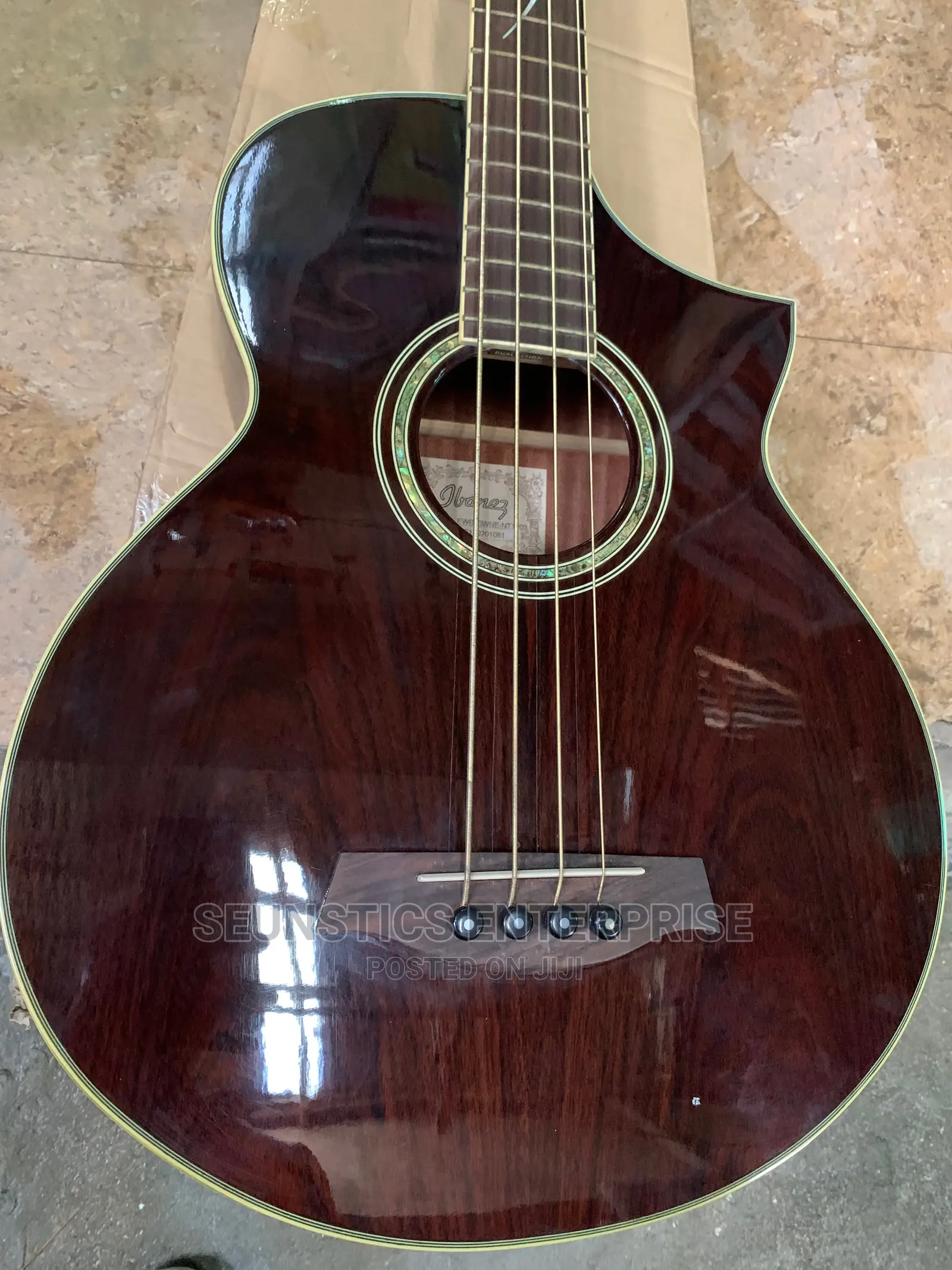 Quality Ibanez Four String Electro Acoustic Guitar