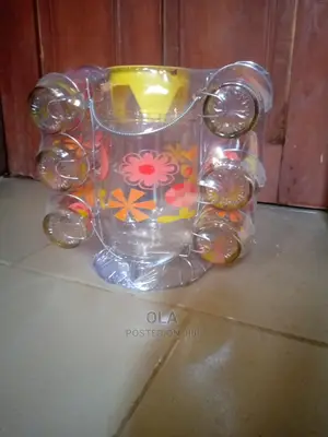 Glassware With Cups, Stainless Stand, and Jug.