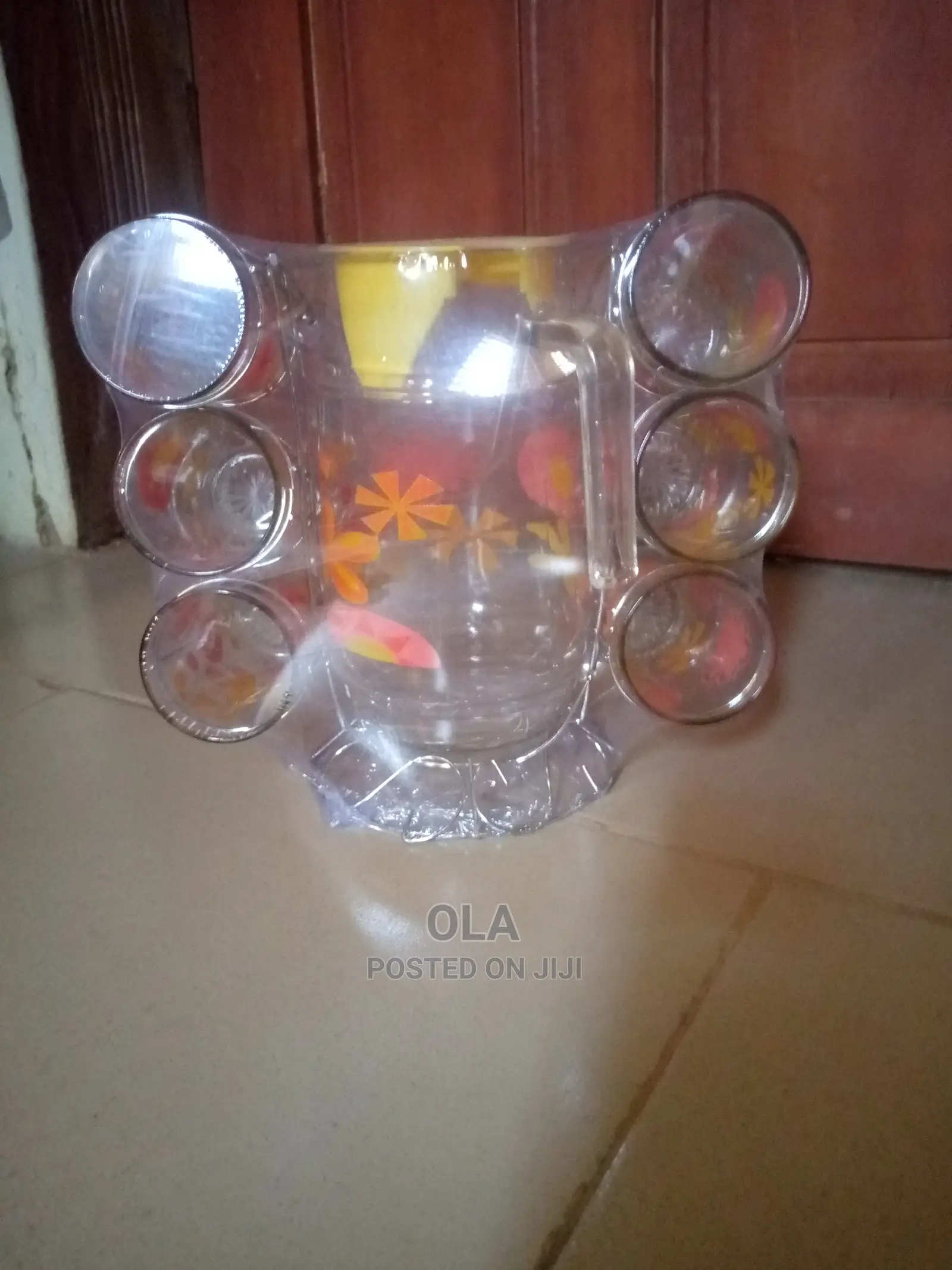 Glassware With Cups, Stainless Stand, and Jug.