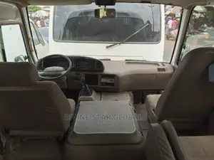 Toyota Coaster 2010 White