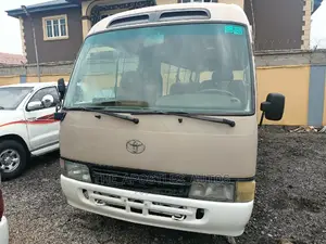 Toyota Coaster 2010 Gold