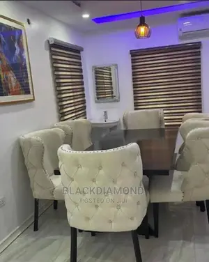 A Set of Dining by Blackdiamond Furniture