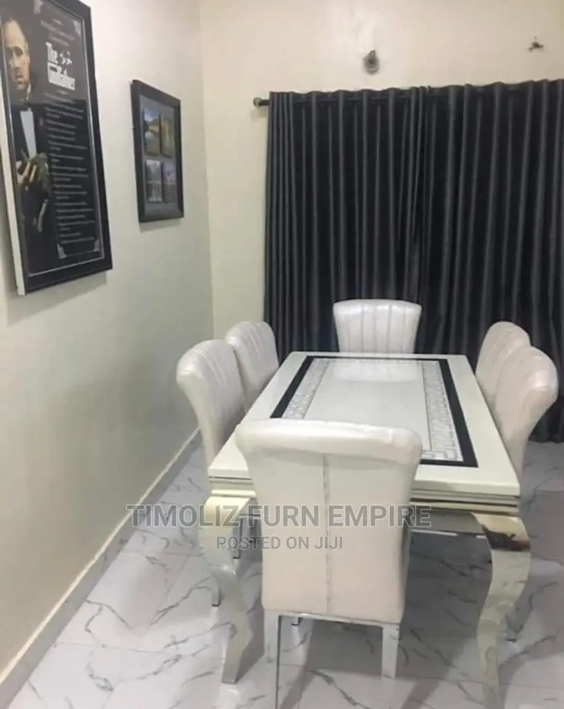 Exclusive Marble Dining Table With 6 Chairs.