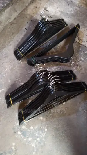 Black Wooden Hangers for Displaying Clothes