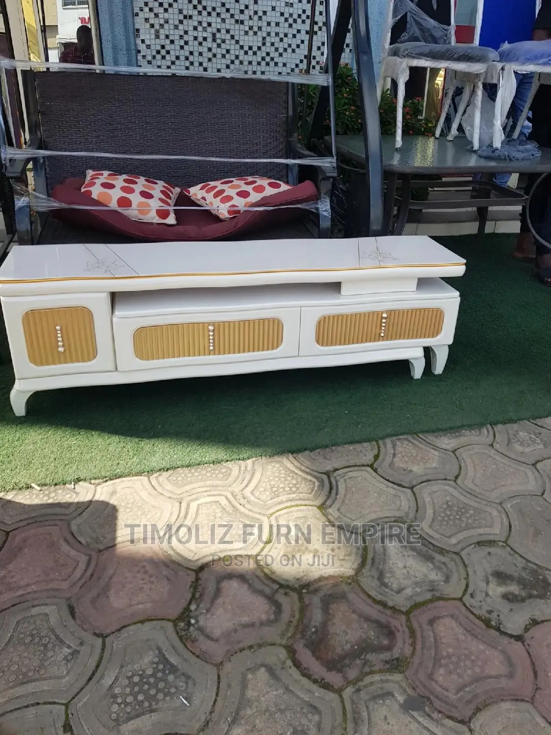 Foreign Adjustable TV Stand With Storage Spaces.